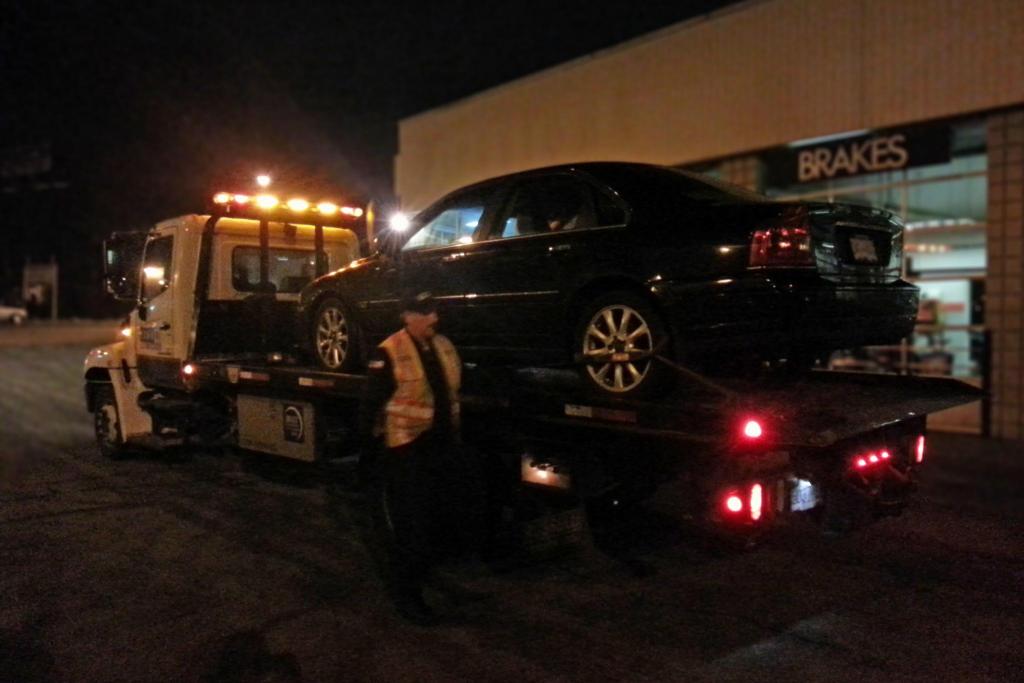My 2004 Volvo S80 being towed