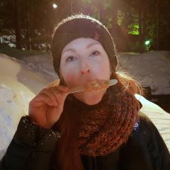 Sara enjoying some maple taffy at la cabane à sucre
